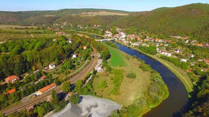 Sticker - Camera flight over a stone quarry on Berounka river near Zbecno.  Industrial landscape in Czech Republic. Heavy industry from above. 