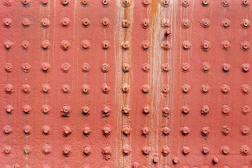 Wall Mural - Riveted metal wall surface