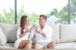 © Dmitry Vavilon  - portrait of nice young couple drinking wine in summer house environment