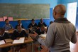 © Wavebreak Media - Male teacher teaching students in the classroom