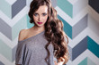 © cherry_d - Beautiful young brunette woman with long curly hair and evening makeup, fashion beauty portrait, casual clothes