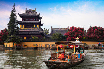 China traditional tourist boats at Shanghai Zhujiajiao town with boat and historic buildings, Shanghai China