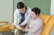 © LStockStudio - A Woman Physician Talking With Her Patient