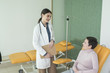 © LStockStudio - A Woman Physician Talking With Her Patient