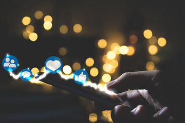 Fototapete - Man using smart phone on night. Social media concept.