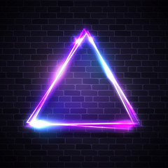 Wall Mural - triangle background on brick texture wall. neon lights street sign with blank space for your design.