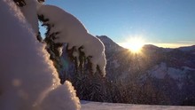 Loop Of SLOW MOTION: Snowflakes Falling On Fresh White Snow Blanket At Magical Sunset