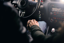 Hands Of Lovers In The New Modern Car.