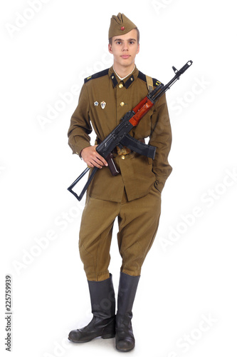 A Soldier In Military Uniform Of Soviet Army Stay And Hold