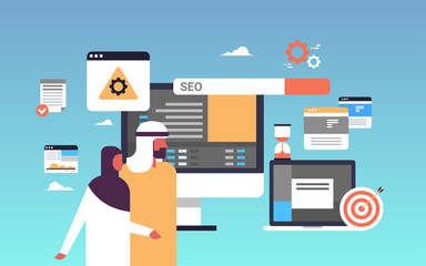 Poster - Seo search engine optimization arab couple man woman monitoring internet searching concept process flat horizontal banner vector illustration