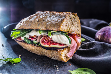 Canvas Print - Sandwich with figs prosciutto spinach arugula and cheese dip