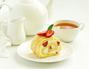 Wall Mural - A piece of biscuit roll with cream and strawberry.