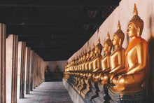 Rows Of Golden Meditation Buddha Image Statues Around The Temple Of Wat Phutthaisawan At Ayutthaya Historical Park, Ayutthaya, Thailand. Vintage Photo And Film Stlye.