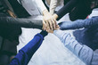 © lesterman - Close up top view of Group of Diverse Hands Together Joining Concept. Friends with stack of hands showing unity and teamwork.