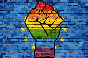 Wall Mural - LGBT Protest Fist on a Europe Brick Wall Flag - Illustration, 
Brick Wall European Union flag and Gay flags