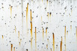 © godji10 - Rusty metal staining on white concrete surface
