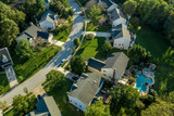 Fototapeta Miasto - Maryland aerial view of middle class neighborhood with houses and pool