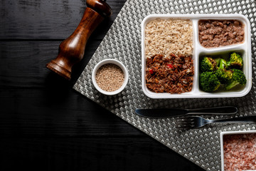 Brown rice with shredded beef and broccoli. Brazilian lunch box. top view