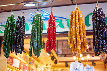 Wall Mural - sweets in the Asian bazaar market, hanging from the churchkhela