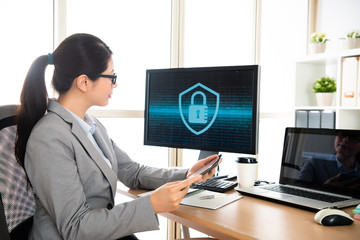 company worker using tablet checking online