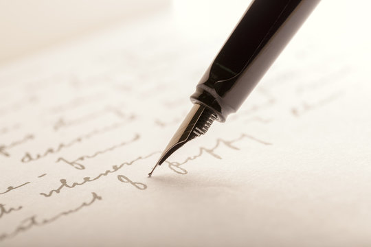 Fountain Pen on Written Page