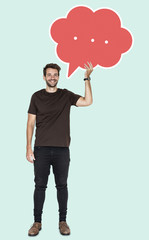 Sticker - Cheerful man holding a blank speech bubble