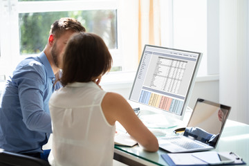 Poster - Two Businesspeople Sitting In Office