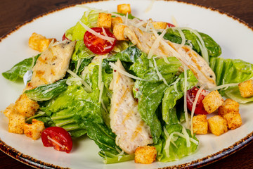 Wall Mural - Caesar salad with chicken