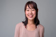 © Ranta Images - Portrait of beautiful Asian woman with hair tied