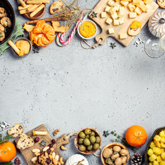 Festive flat lay with christmas dinner party table, holiday vegeterian food concept background, top view with copy space.