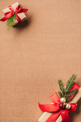Wall Mural - elevated view of decorated gift boxes with christmas baubles on surface