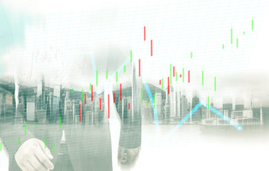 Businessman and Hong Kong city view with blue bull chart on background. double exposure
