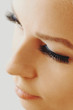 © Olesia - Beautiful girl with long false eyelashes and perfect skin. Eyelash extensions, cosmetology, beauty and skin care