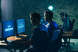 © Pixel-Shot - Young people playing video games at tournament