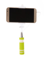 Wall Mural - selfie stick with  mobile phone isolated on a white background