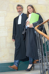 judges walking down staircase