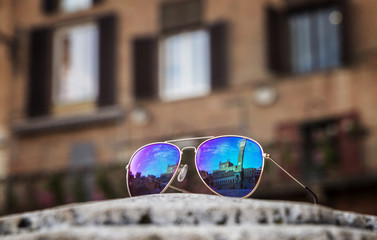 sunglasses and sunglasses on blue background