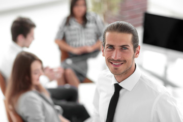 successful young business men on blurred background