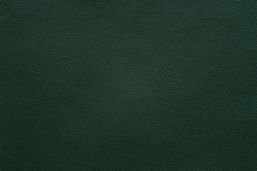 Dark green faux leather with large texture.