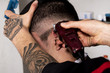 © Juan Ramirez - barber making his cut