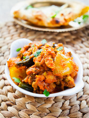 Wall Mural - Vegetable Curry -  Indian Cuisine, Sabzi with tomato potato, okra and cilantro.