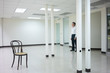 © Paul - Businessman standing in empty bright office and look out thinking thinking