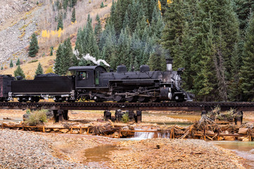 Wall Mural - Vintage Steam Train Crossing a River in Colorado