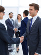 © ASDF - handshake of business partners after the briefing