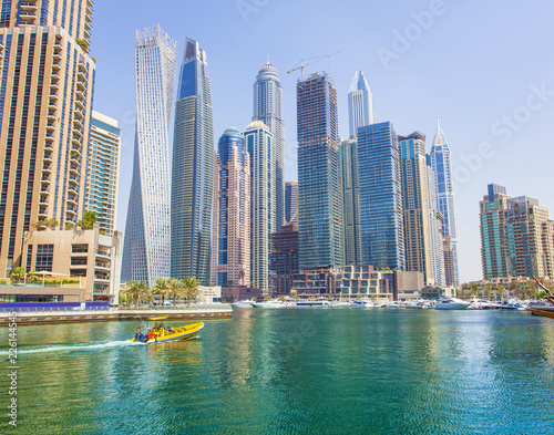 Obraz Dibond boats and modern buildings in Dubai Marina, United Arab Emirates