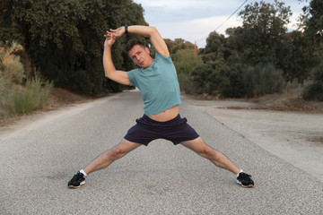 Health athlete doing stretching exercise relaxing and warm up after jogging and running