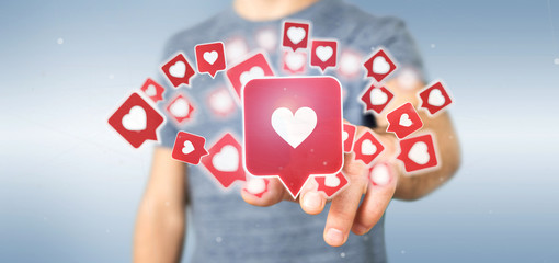 Poster - Businessman holding Like notification on a social media 3d rendering