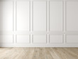 Modern classic white empty interior with wall panels and wooden floor.