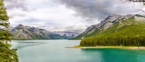 Wall Mural - Panoramic view at the nature around Minnewanka Lake in Banff National Park of Canada