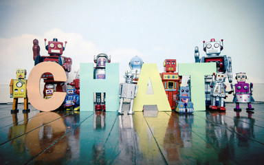 Wall Mural - robots hold up the word CHAT